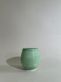 Green porcelain cup