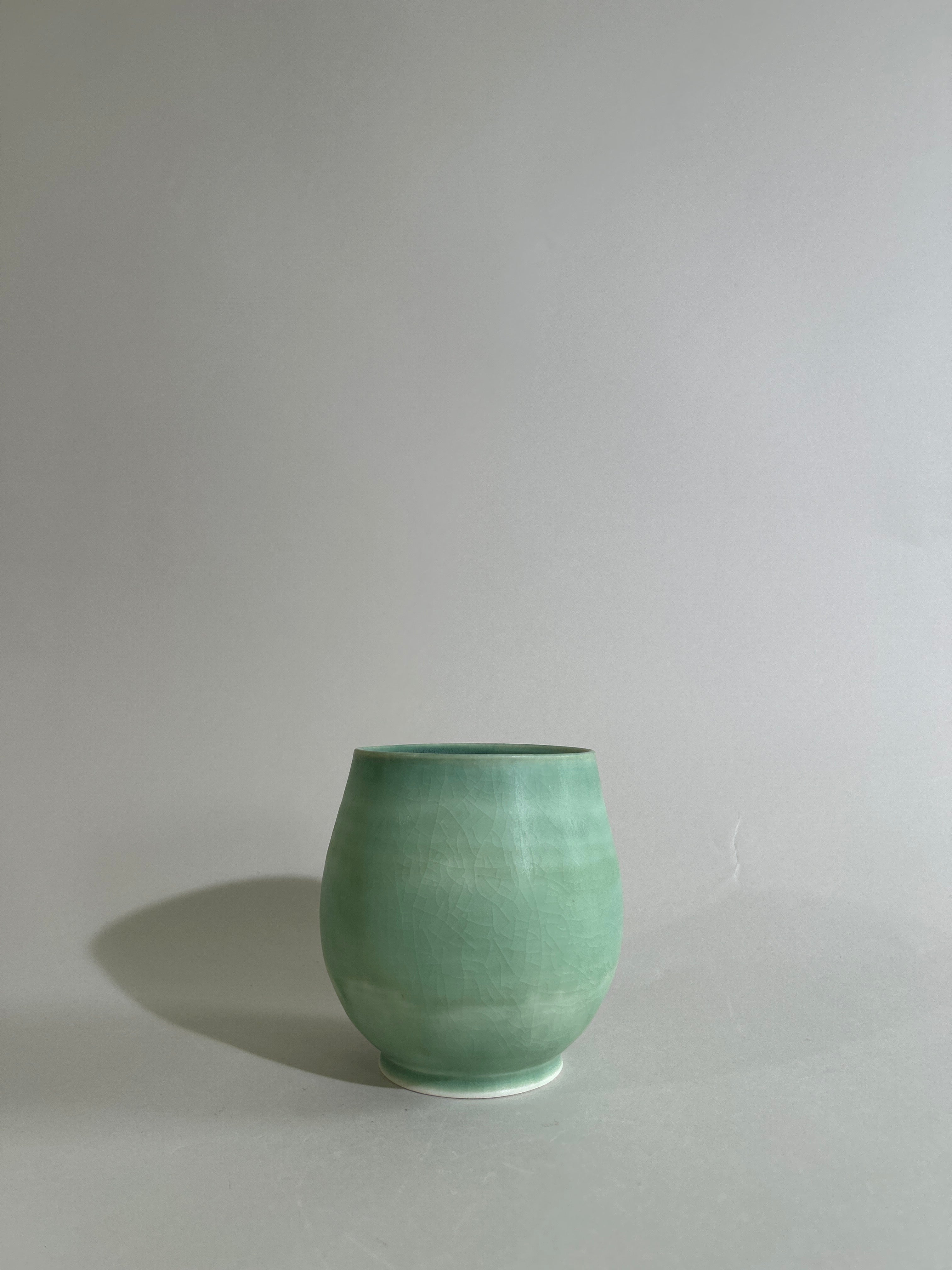 Green porcelain cup