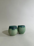 Green stoneware cup