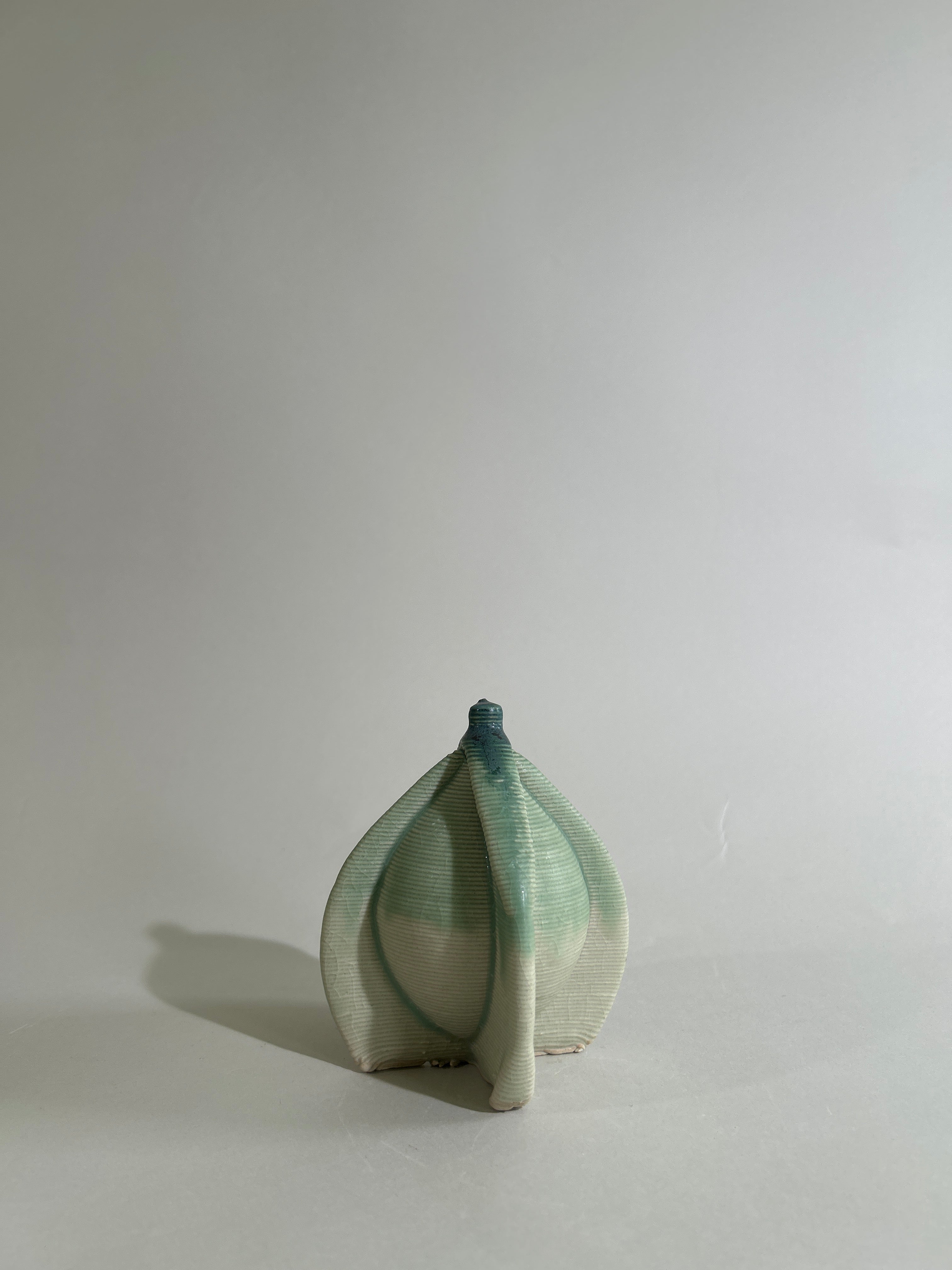 3-D printed green stoneware mini Bottle 2