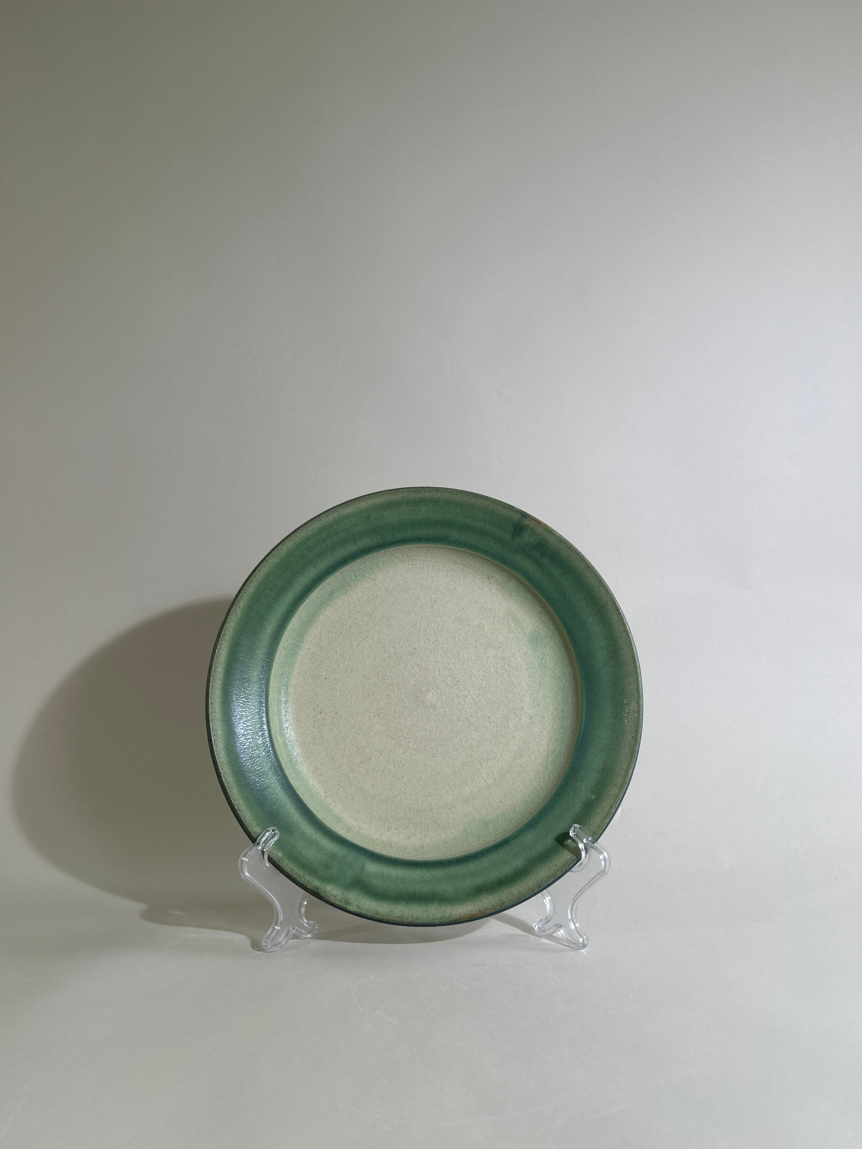 Green stoneware dinner plate