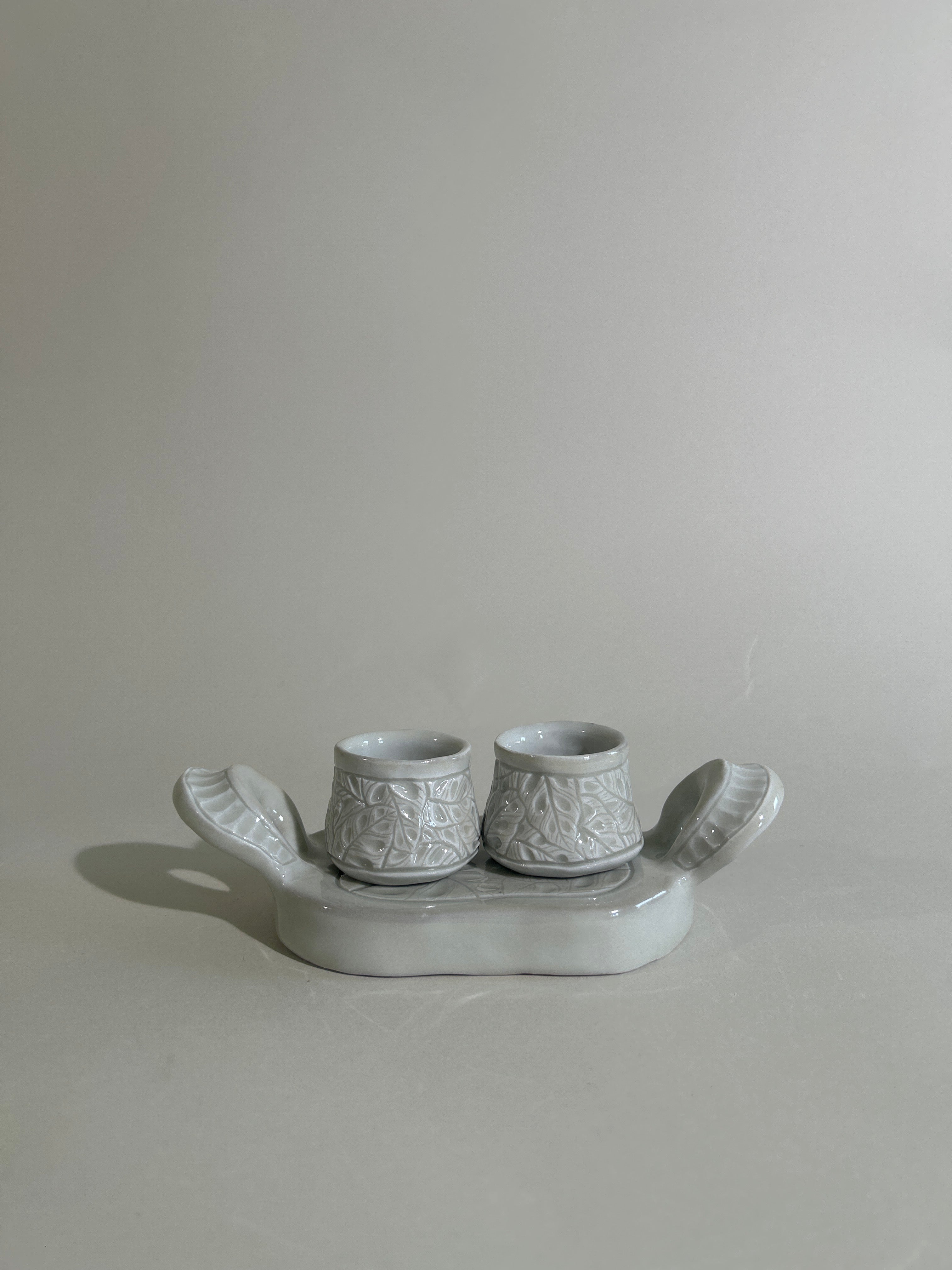 Porcelain leaf cup duo with tray one tray two shot glasses