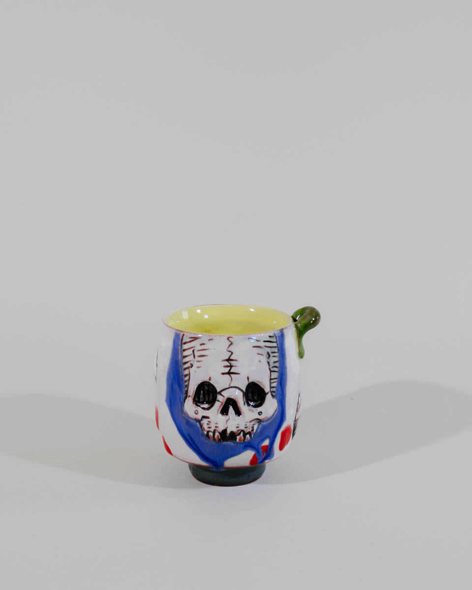 Cup sipper  bas relief decoration with lip doodad 1