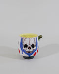 Cup sipper  bas relief decoration with lip doodad 2