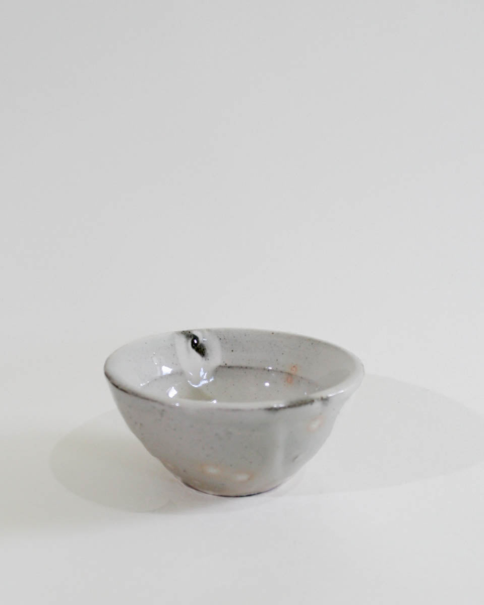 White bowl with ash colored accents